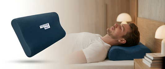 Ergonomic memory foam cervical pillow supporting neck and shoulders for pain relief and proper spinal alignment